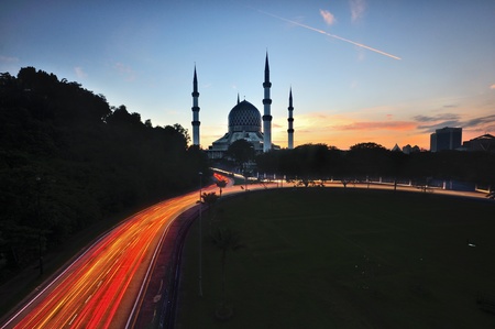 Mosque with beautiful sunrise during blue hoursの写真素材