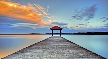 Beautiful sunset with bridgeの写真素材