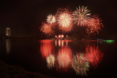 Fireworks with reflectionの写真素材