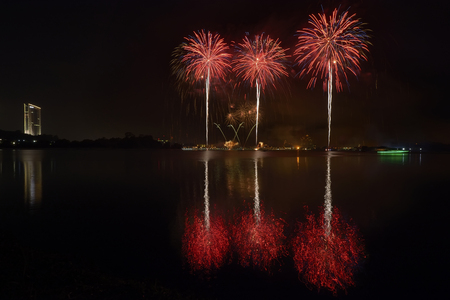 Fireworks with reflectionの写真素材