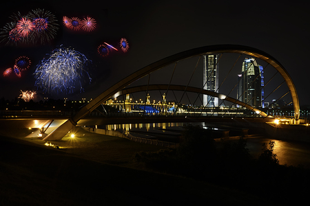Fireworks with bridge and buildingの写真素材