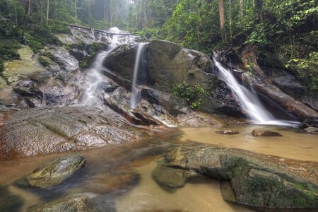 Natural waterfall in tropical rain forestの写真素材