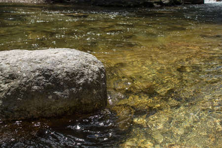LANDSCAPE OF THE WATER OF THE RIVER FLOODING THROUGH THE DESHIELOS