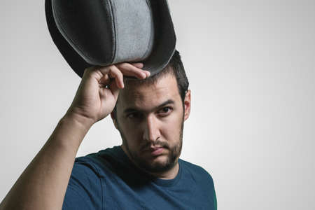 man with hat in sexy posesの写真素材