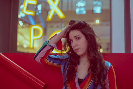 portrait of pretty woman with neon lights