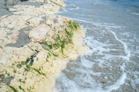 Beautiful beach with rocks and calm waters