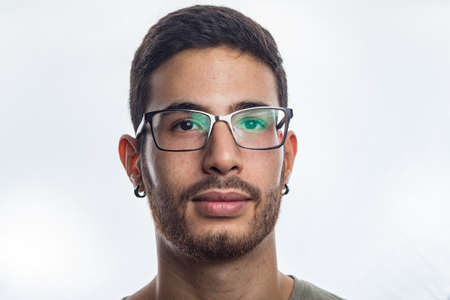 portrait of young man with glasses and beard