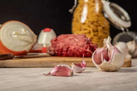 still life of minced meat, preparation of macaroni bolognese