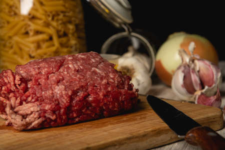 still life of minced meat, preparation of macaroni bolognese