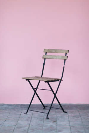 vintage chair with pink wall nobodyの写真素材