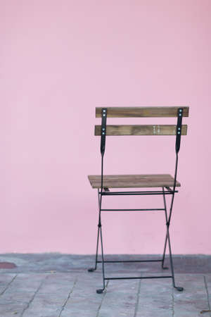 vintage chair with pink wall nobodyの写真素材