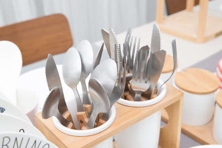 Old cutlery in a glassの写真素材