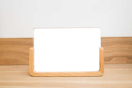 picture frame on wooden tableの写真素材