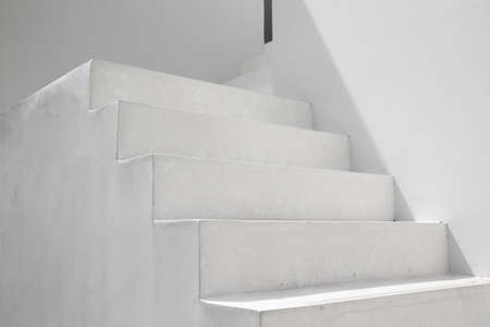 a typical traditional house ascending white stairsの写真素材