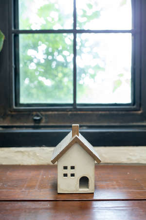 wooden toy House on wooden desk ,front view
