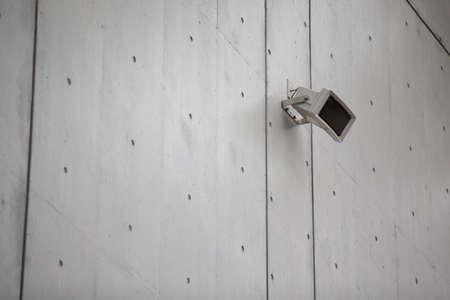 Speakers on a cement wall background.の写真素材