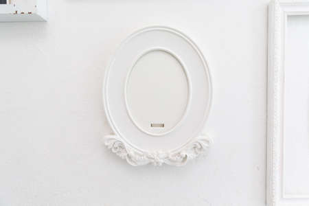 Vintage retro old oval white picture frame.の写真素材