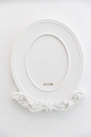 Vintage retro old oval white picture frame.の写真素材