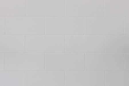 Closeup of modern white block brick wall or floor texture background.