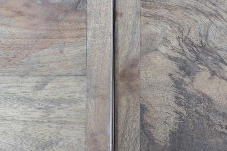 top view of wooden desk texture background with seam.