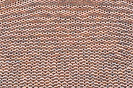 surface of traditional clay roof tiles of chinese asian temple background texture