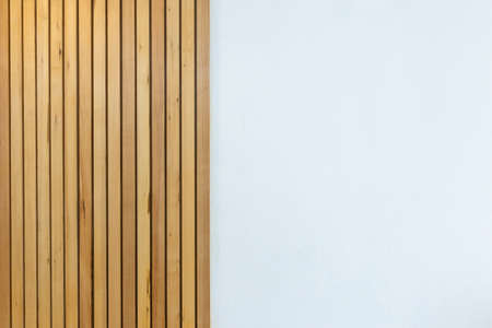 close up view of wooden plank sliding door or fence and cement wall texture background with copy...