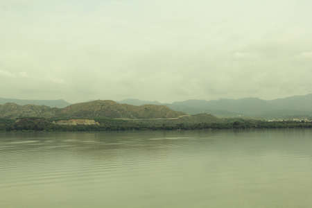 View of the Mekong River and the mountains in the background.の写真素材