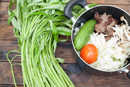 Vegetables in a cooking potの写真素材