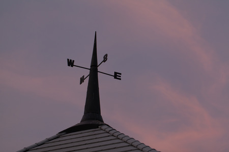 siluate view of the arrow direction on a pole.の写真素材