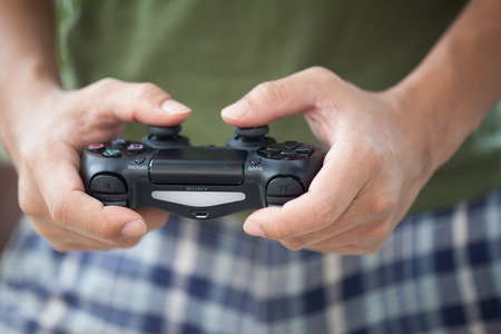 THAILAND -OCTOBER 2: the new sony dualshock 4 controller for PlayStation 4 taken in BANGKOK THAILAND on October 2, 2015.のeditorial素材