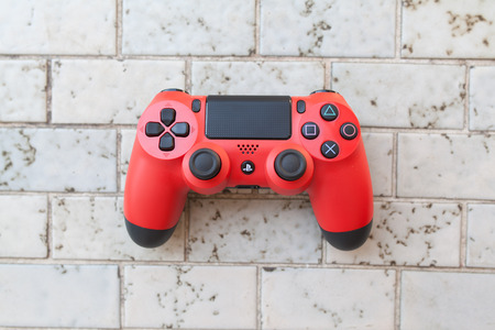 THAILAND - AUGUST 12: the new sony dualshock 4 controller for PlayStation 4 taken in BANGKOK THAILAND on 12 August 2014.のeditorial素材
