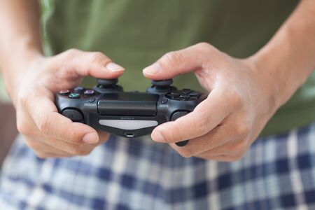 THAILAND -OCTOBER 2: the new sony dualshock 4 controller for PlayStation 4 taken in BANGKOK THAILAND on October 2, 2015.のeditorial素材