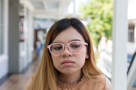 Young asian woman touchy at outdoor, Attractive young womanの写真素材