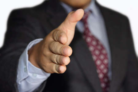 male businessman offering handshake for a business deal