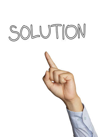 image of a businessmen's finger pointing to solution wordの写真素材