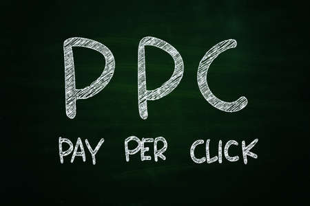 PPC Pay Per Click Lettering, written with Chalk on Blackboardの写真素材