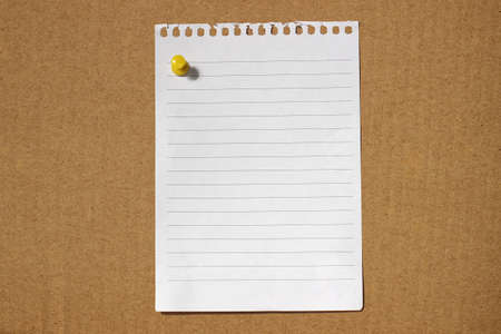 Image of blank note paper on cardboard backgroundの写真素材