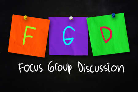 The words FGD Focus Group Discussion written on chalkboardの写真素材