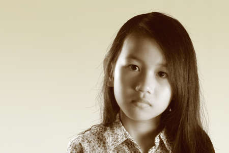 Asian girl portrait with black long hair in sepia colorの写真素材