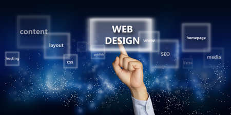 Business concept image of a businessman hand clicking Web Design button on virtual screen over space backgroundの写真素材