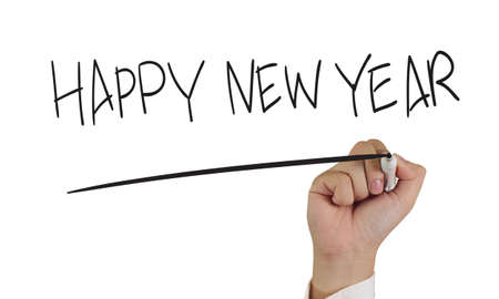Image of a hand holding marker and write Happy New Year isolated on whiteの写真素材
