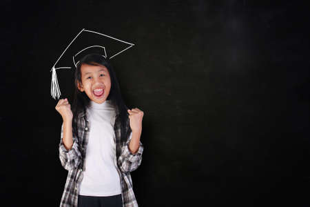 Success concept, portrait of happy cute beautiful Asian girl showing enthusiastic winning gesture...