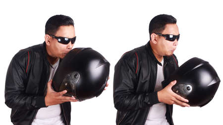 Portrait of young attractive Asian men wearing black leather jacket and sunglasses checking...
