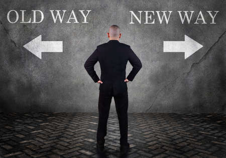 Dilemma in business concept. Businessman confuse to choose old way or new way