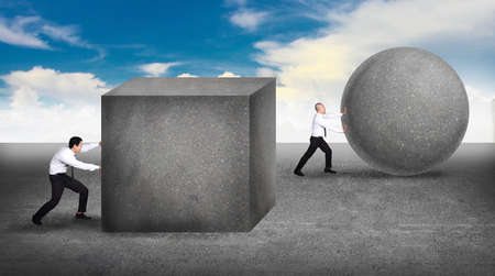 Business concept businessman pushing a sphere leading the race against a slower businessmen pushing box. Winning strategy, efficiency, innovation in business concept