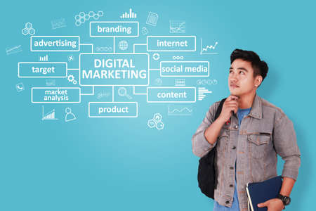 Business concept. Asian young creative businessman smiling with Digital Marketing graphic words...