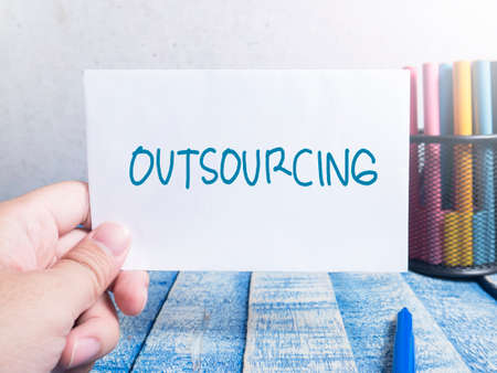 Outsourcing, business motivational inspirational quotes, words typography lettering conceptの写真素材