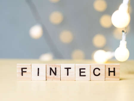 Finance Technology Fintech, business motivational inspirational finance quotes, wooden words typography lettering conceptの写真素材