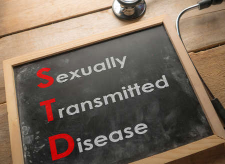 Medical and health care words writing typography lettering concept, STD Sexually Transmitted Diseaseの写真素材