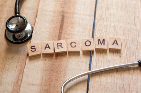 Medical and health care words writing typography lettering concept, Cancer Sarcoma